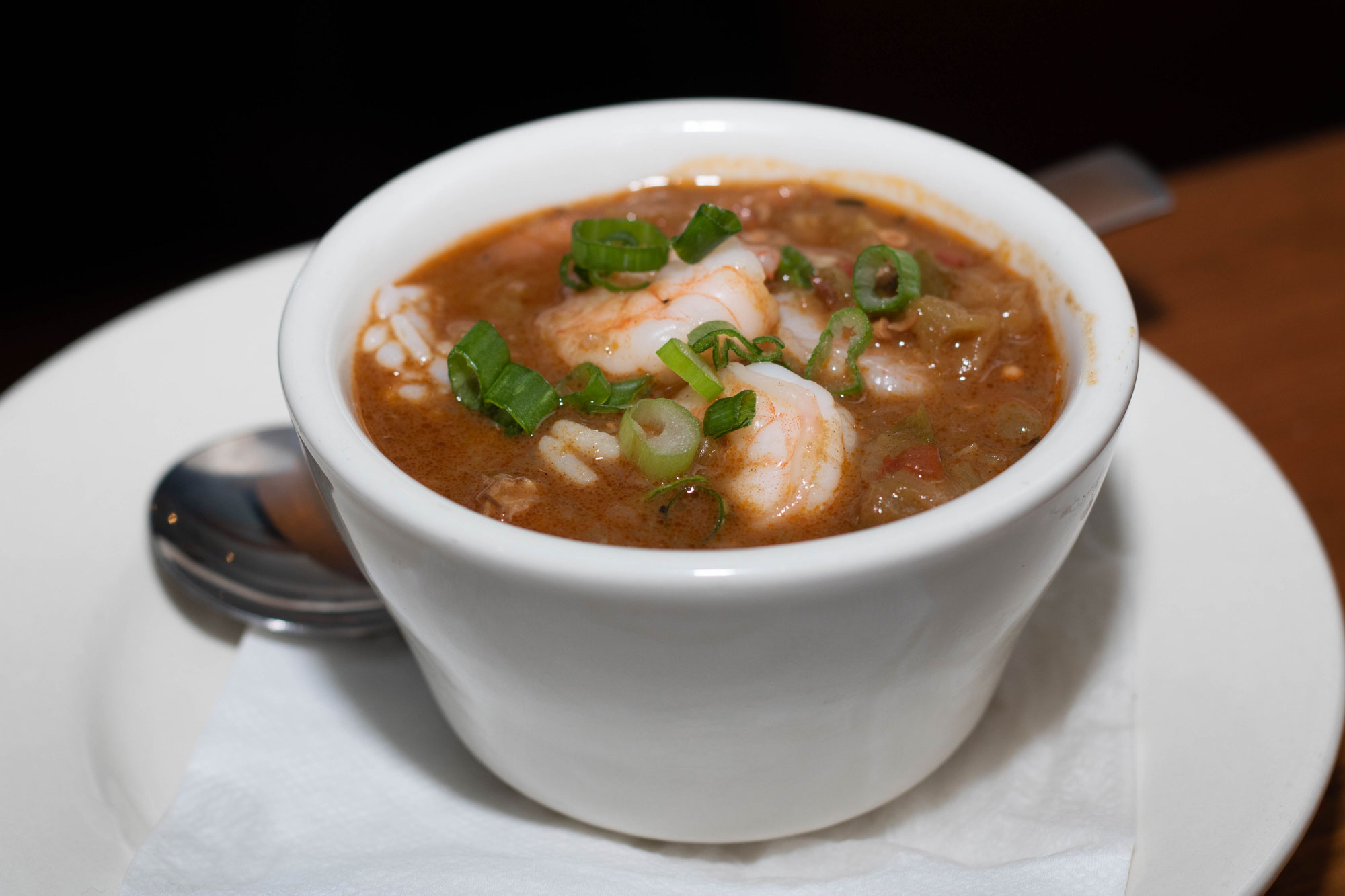 Our homemade gumbo with shrimp, andouille sausage, and chicken in a flavorful dark roux with white rice.