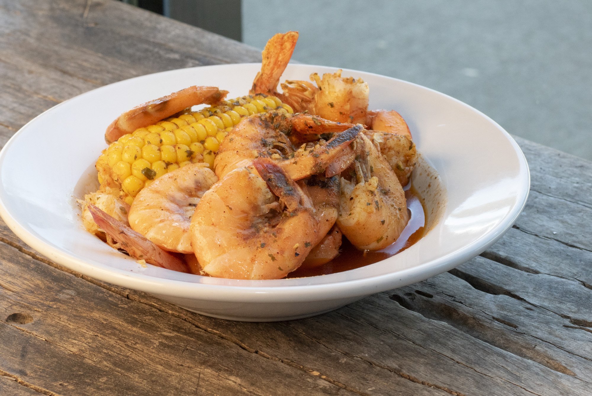 1 dozen shrimp, corn & potato tossed in your choice of flavor