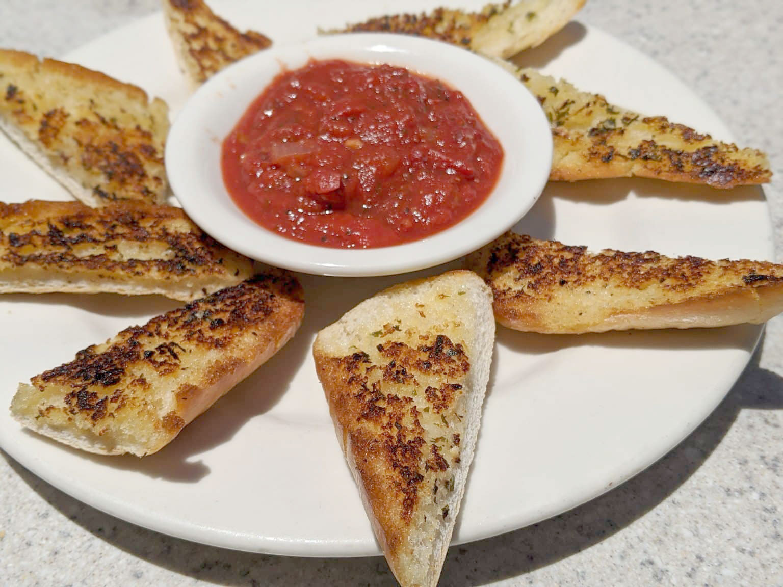 Toasted garlic bread with marinara sauce