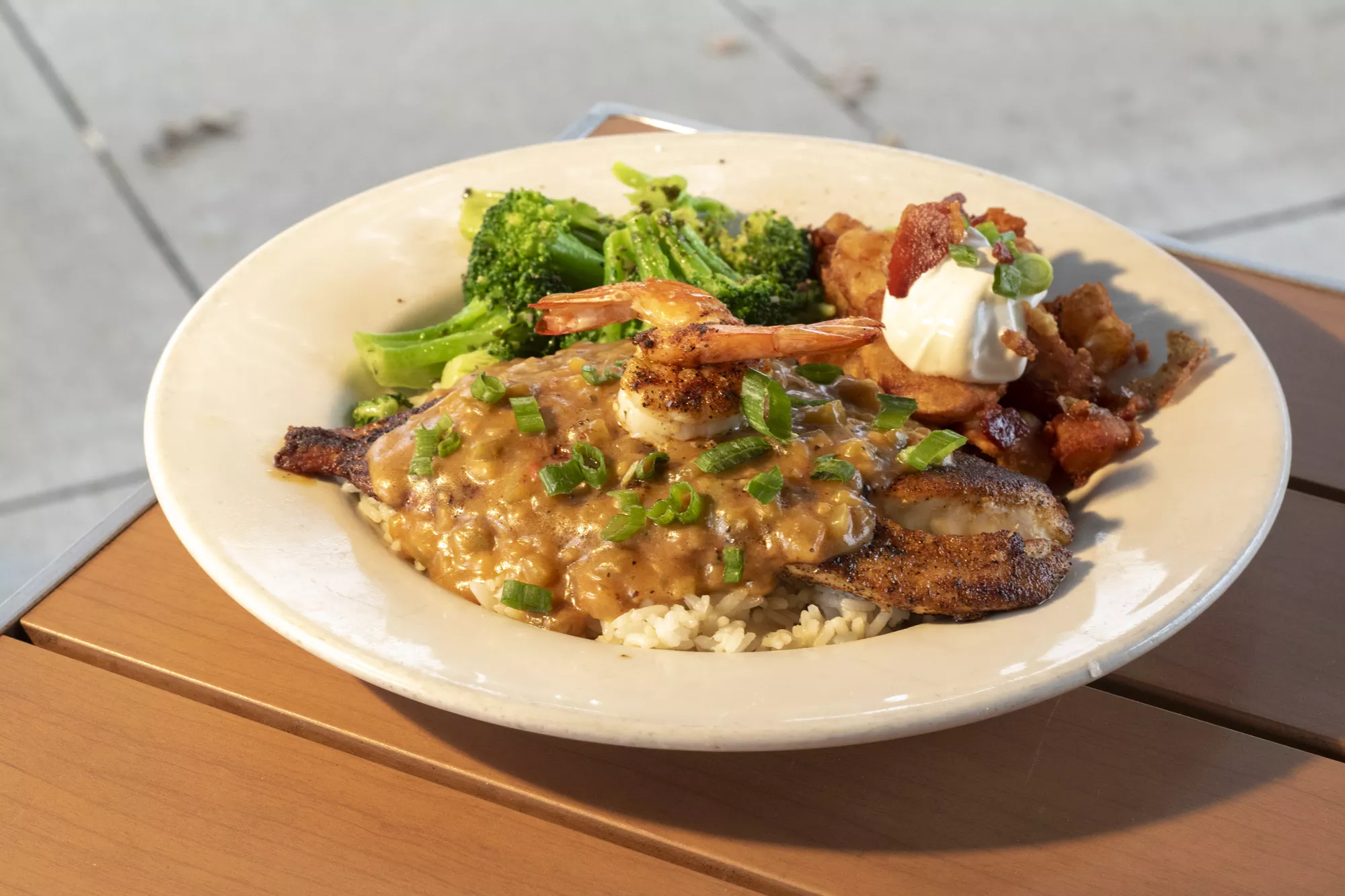 Blackened, with 2 large blackened shrimp and our homemade etouffee on rice