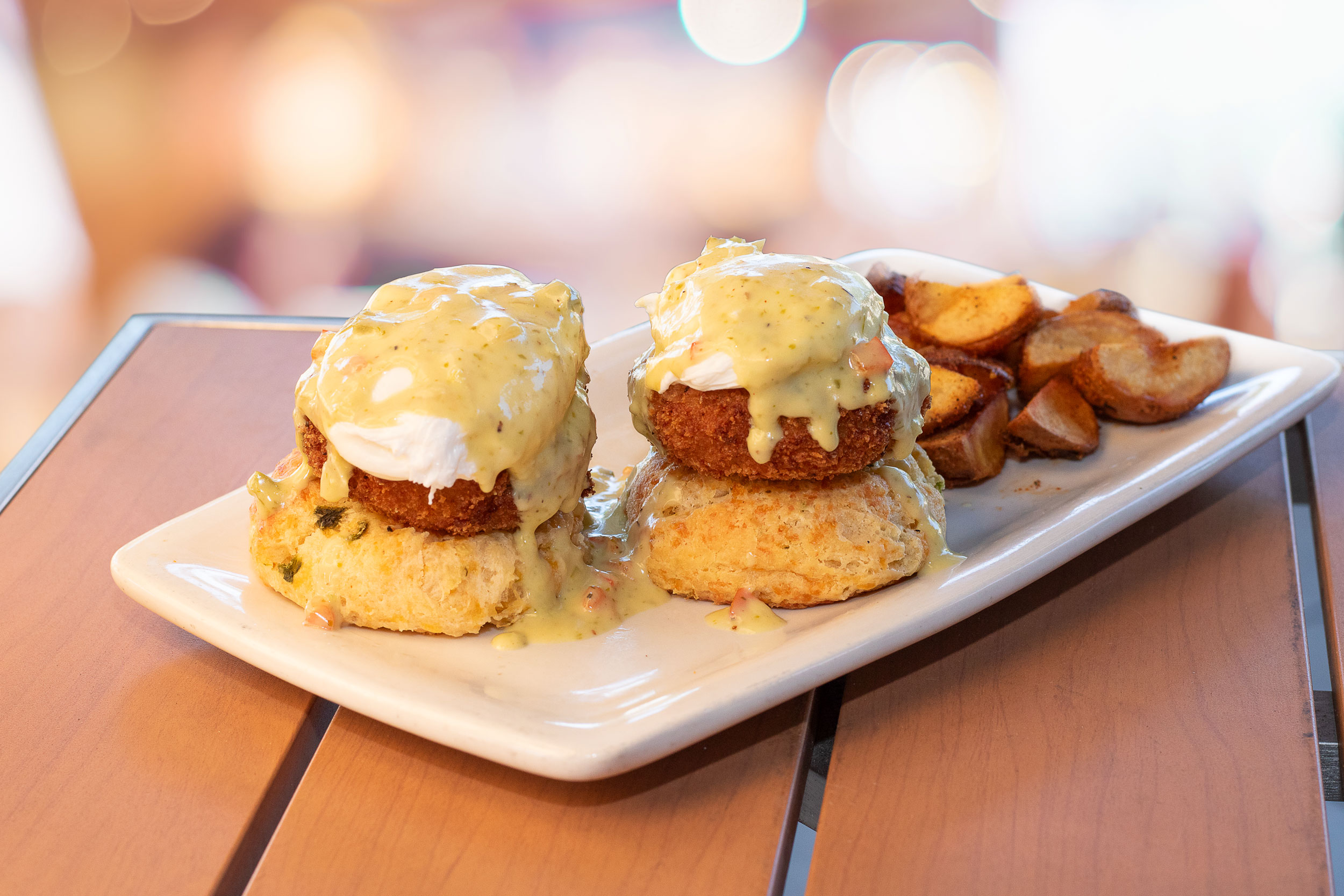 Two poached eggs atop our fried lump crab cakes served over our freshly baked jalapeño cheddar biscuits and drizzled with creamy jalapeño gravy. Served with breakfast potatoes. Substitute blackened or grilled salmon for no charge